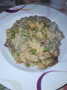 RISOTTO CON CARNE DI MAIALE E PISELLI